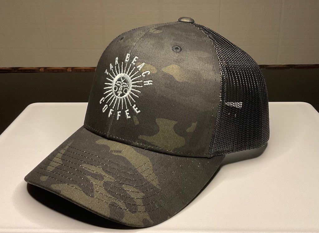 This high quality hat is a Retro trucker fit with a black multi camoflauge. It has an adjustable snap closure in the back and black under visor.